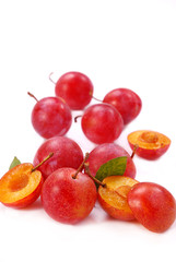 plums isolated on white