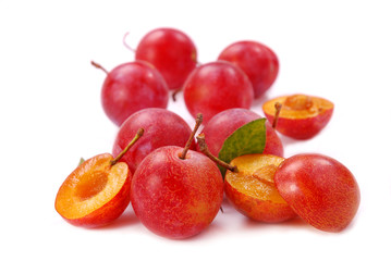 plums isolated on white