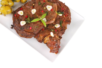 roast beef slice on white dish