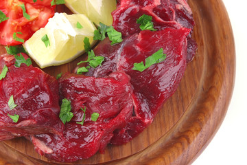 beef ribs on wooden plate