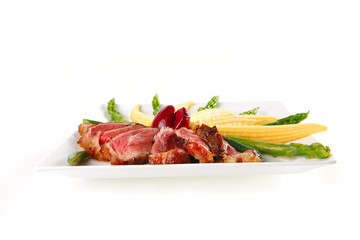 beef meat served with corns