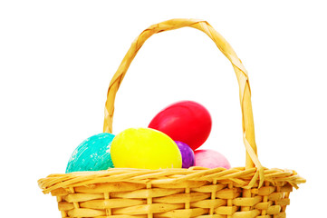 Naklejka premium Easter concept with eggs and basket on white