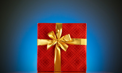 Gift box against gradient background