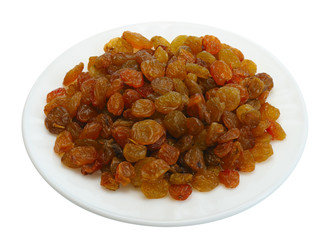 Raisin on a white plate on a black background