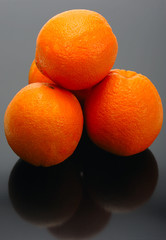 Oranges on a black background