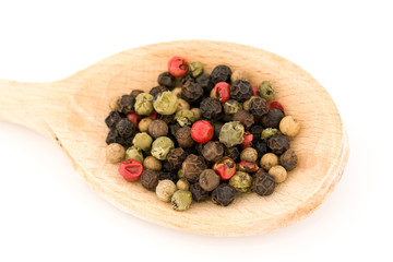 Mixed Peppercorns  on a Wooden Spoon