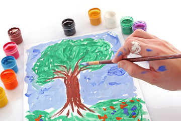 Opened paint buckets colors and drawing tree