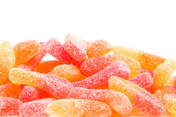 pile of sugar candy over white background