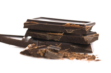 Chopped chocolate isolated on the white background