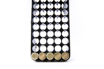 Bullets on the white surface