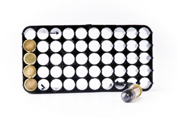 Bullets on the white surface
