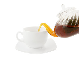 Black tea pouring isolated on white background