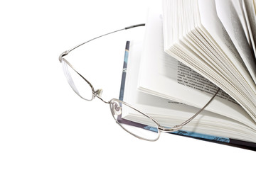 glasses with an open book
