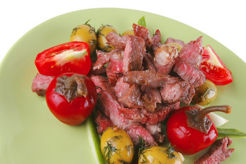 beef meat served on green