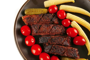 roast beef with tomatoes and corns