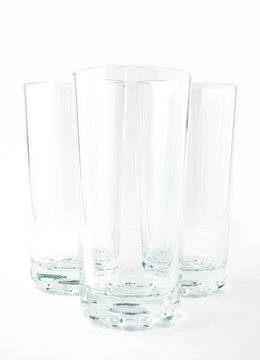 three empty glasses on a white background