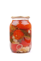 The clear glass jar of colorful pickled vegetables