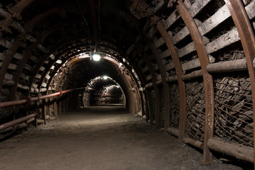 Reinforced tunnel in coal mine - obrazy, fototapety, plakaty