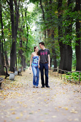 Man and woman on a walk in park