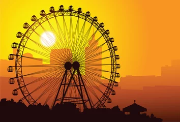 Deurstickers Silhouette of a ferris wheel at sunset. © Smulsky