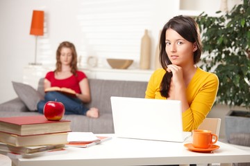 Teen students learning at home