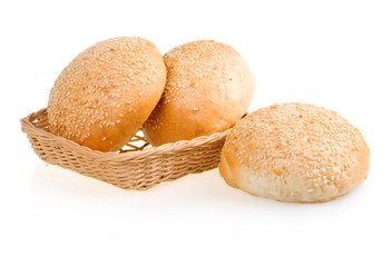 Three Baked Buns with Sesame in Basket
