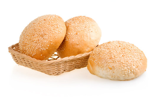 Three Baked Buns with Sesame in Basket