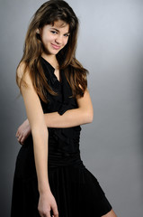 Fototapeta premium adorable model smiling in black dress