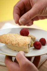 home made bramley apple pie with raspberries