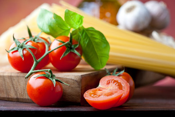 Ciliegino tomatoes, spaghetti, garlic and basil