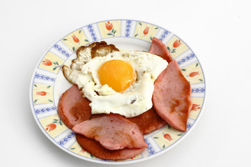 eggs with sausage for breakfast on the plate