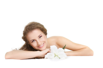 Obraz na płótnie Canvas studio shot of beautiful woman with white lily flower