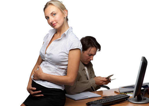 Businessman and pregnant secretary