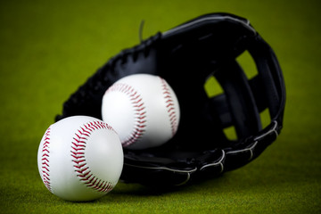 Leather glove with baseball