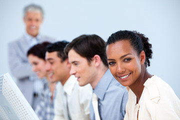 Fototapeta premium Confident business people with their senior manager