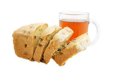 Fruitcake slices and cup of tea isolated on white