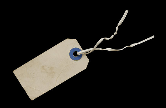 Old Worn Blank Identification Tag on Black Background
