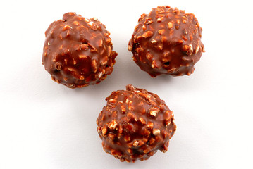Balls of chocolate with nuts