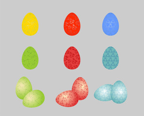 painted Easter eggs on grey background