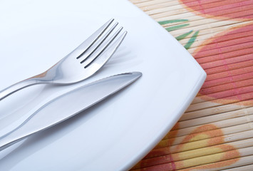 Still life image of fork and knife.