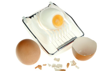 an egg-cutter with some eggs