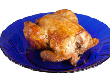 Grilled hen on dish