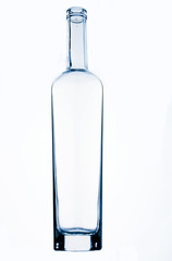 empty transparent glass bottle, blue tinted