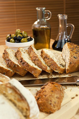 Sliced Rustic Bread, Olive Oil, Stuffed Green & Black Olives