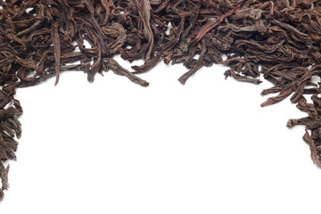 Out of focus black tea leaves background with copy space