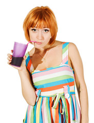 Beautiful red girl with glass of soda