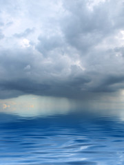 clouds hanging over the sea