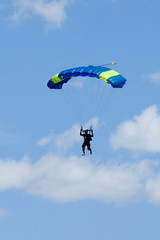 Extreme sports. parachuting under a blue sky