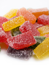 delicious sweet candies in sugar. white background