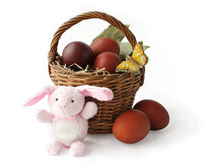 Basket with Easter eggs and the rabbit
